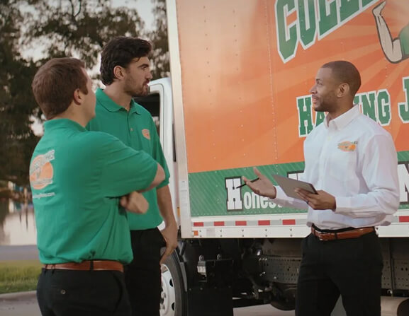 Franchise owner with team.